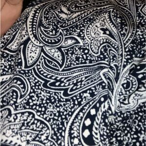 Black and white. Patterned.